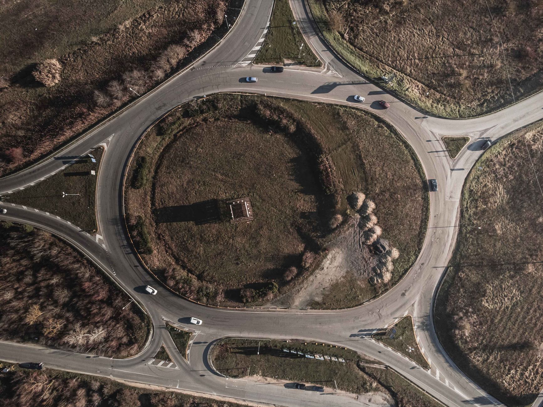 A roundabout seen from above, where lane discipline faults commonly cost learners their test